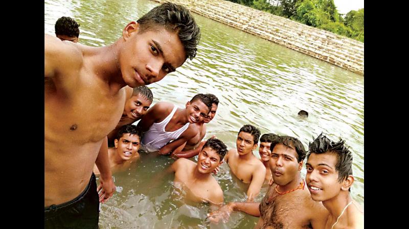 NCC cadets take selfie even as Vishwas G. (circled) unnoticed drowns at Kanakapura on Sunday