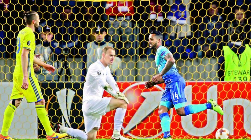 Theo Walcott (right) celebrates after scoring the opening goal against BATE on Thursday (Photo: AP)