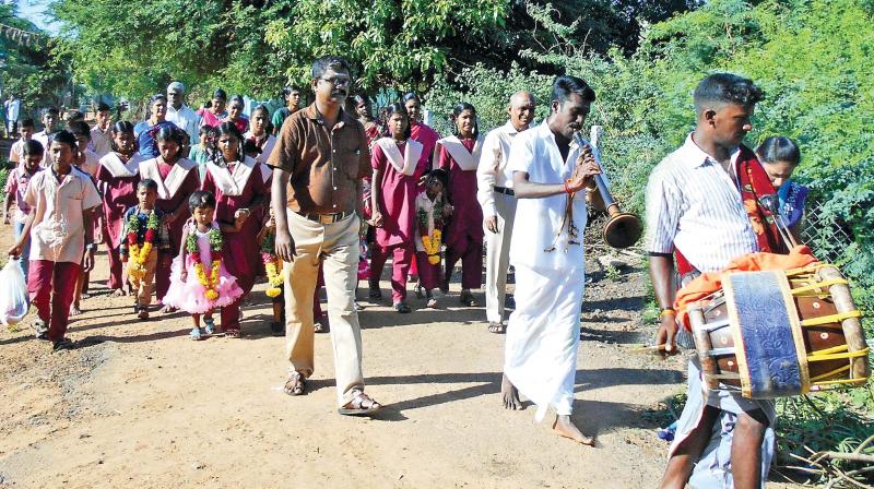 The nine newly enrolled kids are garlanded and taken in procession by students and staff to create awareness about the need for education (Photo: DC)