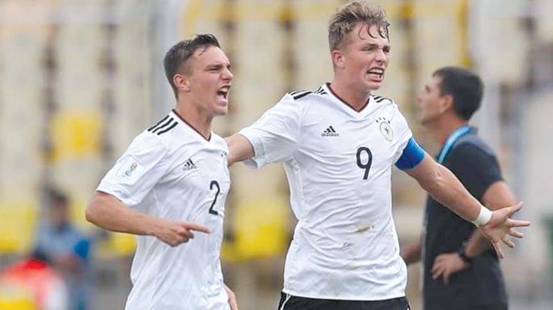 Jann-Fiete Arp (number 9) of Germany celebrates after scoring his teams first goal during a Group C match