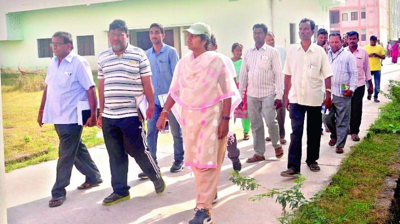 Guntur municipal commissioner Ch. Anuradha inspects sites for Housing for All scheme in Guntur. (Photo: DC)