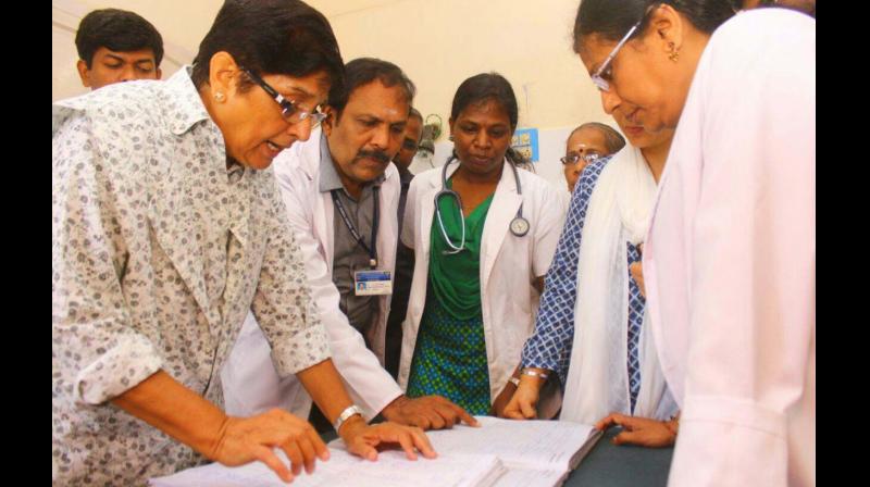 Bedi checks hospital records during her visit to the government hospital in Karaikal on Wednesday. (Photo: DC)