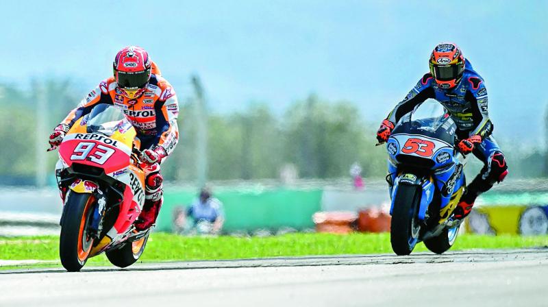 Repsol Hondas rider Marc Marquez rides during the third practice session of the Malaysia MotoGP at the Sepang International circuit in Sepang, Malaysia on Saturday. (Photo: AFP)
