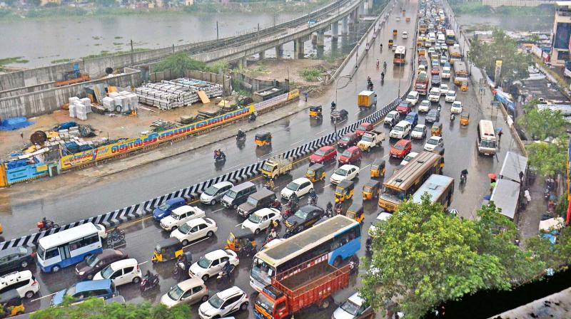 Aerial view of traffic on Saidapet flyover due to waterlogging on Anna Salai.(Photos by N. Sampath and E.K. Sanjay)