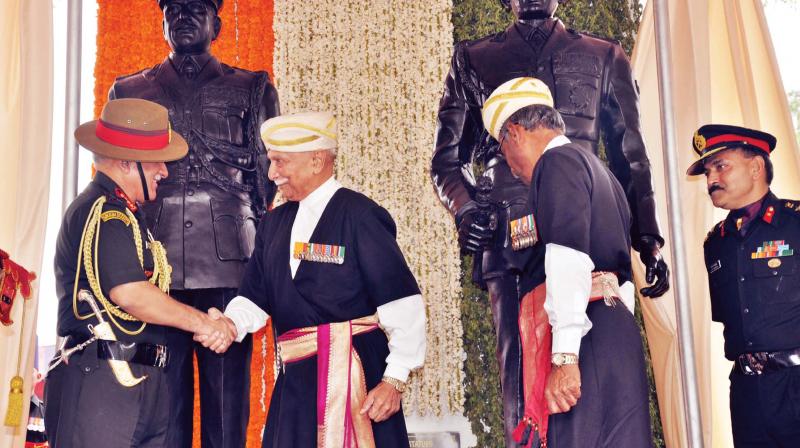 Kodava ex-servicemen greet Army chief Gen Bipin Rawat who unveiled the statues of  Field Marshal K.M. Cariappa and General K.S. Thimayya at Cauvery College at Gonikoppa in South Kodagu on Saturday (Photo: KPN)
