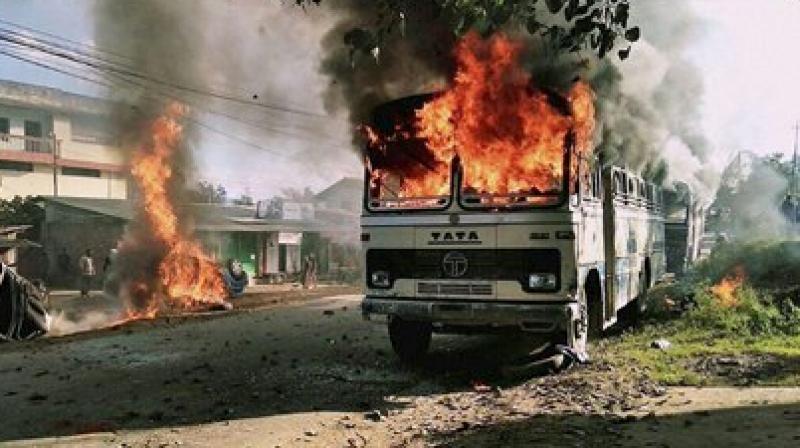 Angry people set on fire vehicles in Imphal East district in protest against the United Naga Council (UNC)s indefinite economic blockade. (Photo: PTI/File)
