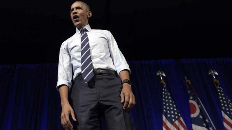 Obama gave no hint about what he actually might like to do after vacating the White House in January, but he seemed in no hurry to leave the political scene. (Photo: AP)