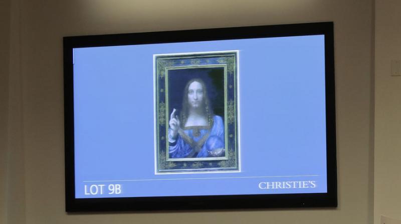 A 500-year-old work of art  believed to be by Leonardo da Vinci and depicting Jesus Christ  sold in New York for $450.3 million, smashing a new art auction record.