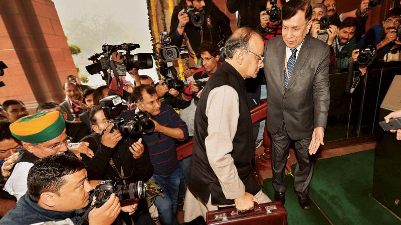 Finance Minister Arun Jaitley arrives in Parliament to present the Union Budget for 2017-18, in New Delhi on Feb. 1 (Photo: PTI)