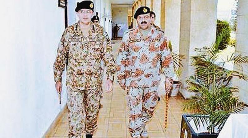Lt. Gen Naveed Mukhtar (left) was appointed as director-general of the ISI. (Photo: Twitter)