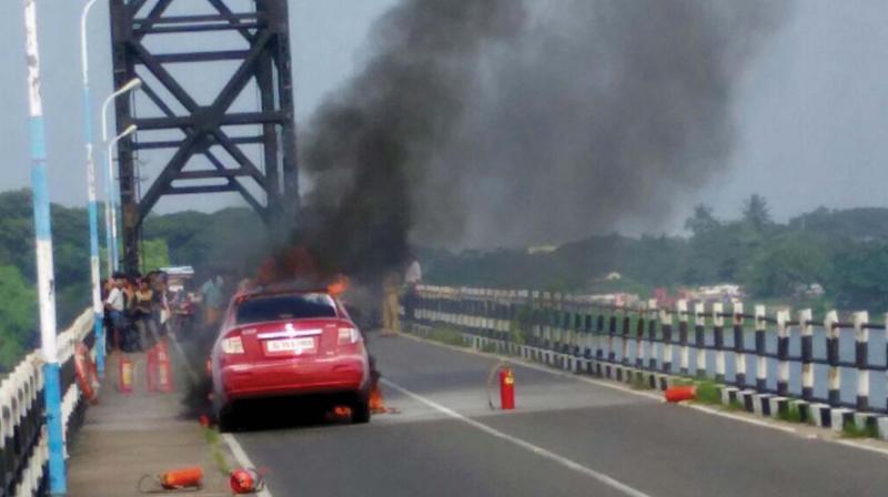 The incident happened at 2.45 pm when the car driven by one Antony, a native of Nazreth near Fort Kochi, caught fire reportedly due to a short-circuit problem.