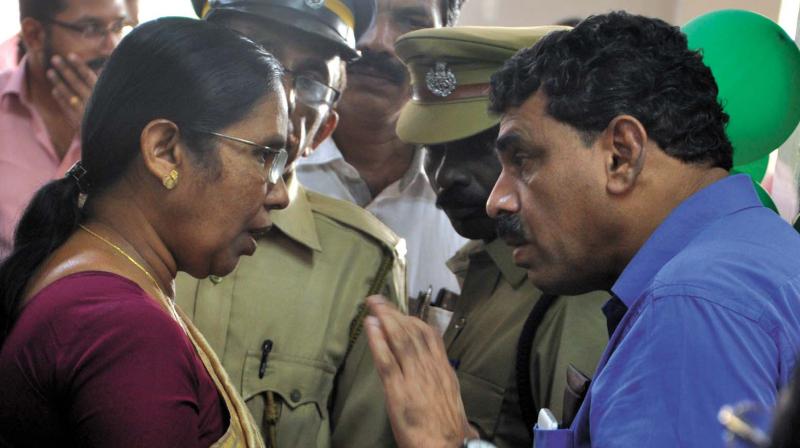 Shamnas father K.A. Abootty talks with health minister K.K. Shylaja during the cancer centre OP inauguration in Kochi on Friday: (Photo:  Sunoj Ninan Mathew)