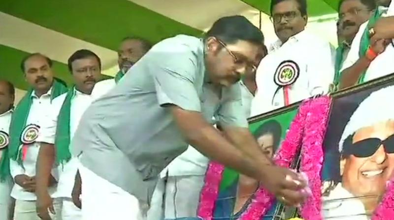 The sit-in was led by Dhinakaran himself who paid tributes to former chief minister Jayalalithaa and MGR before beginning the strike. (Photo: ANI/Twitter)