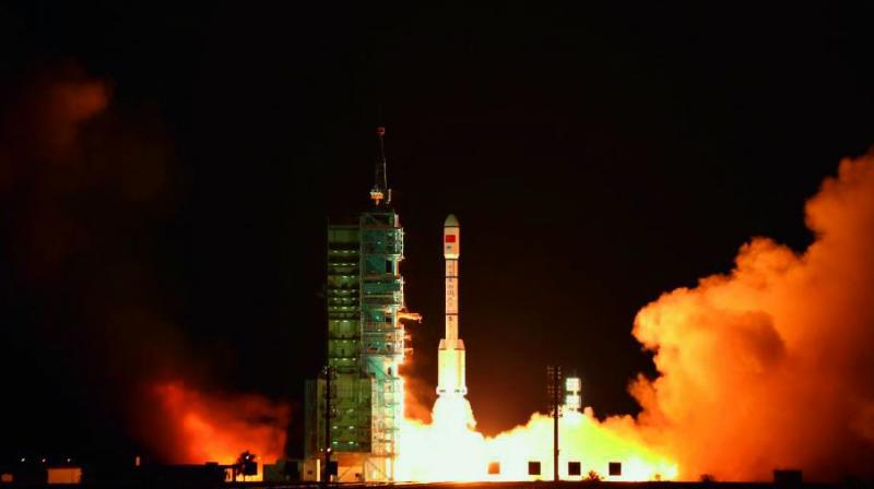 Tiangong-2, Chinas second space laboratory, taking off for launch.	 Via web