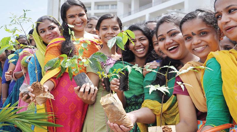 Students display saplings on the occasion of World Environment day in Kochi. (file pic)