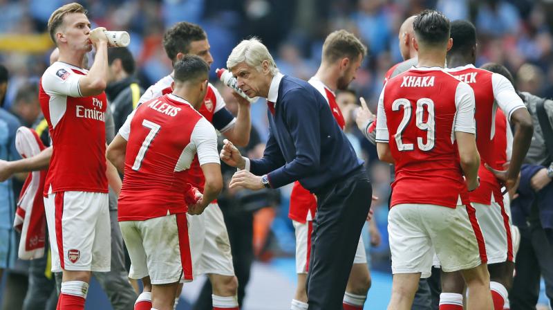 The result gave Arsenal manager Arsene Wenger, an FA Cup winner six times, a welcome boost in a season that many supporters would like to be his last at the club. (Photo: AP)