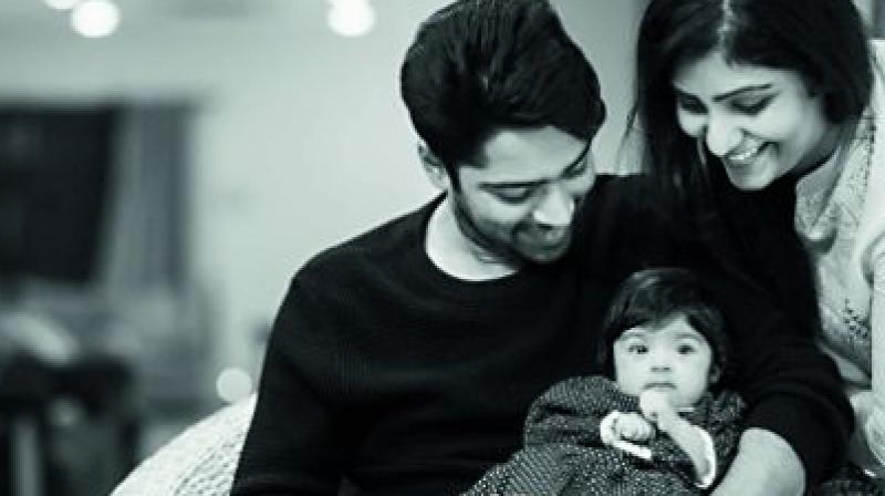 Allari Naresh tweeted this  photograph of himself with his wife and daughter