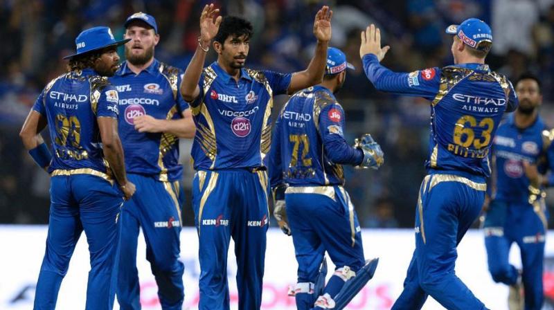 Jasprit Bumrah (3/24), Harbhajan Singh (2/23) stared as Mumbai Indians secured their second consecutive win in the tenth edition of Indian Premier League by beating defending champions Sunrisers Hyderabad by four wickets here on Wednesday. (Photo: AFP)