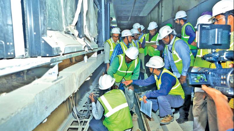 Commissioner of Metro Rail Safety KA Manoharan, and his team inspecting the corridor from Koyambedu to Shenoy Nagar on Wednesday. CMRL officials also seen. (Photo: DC)