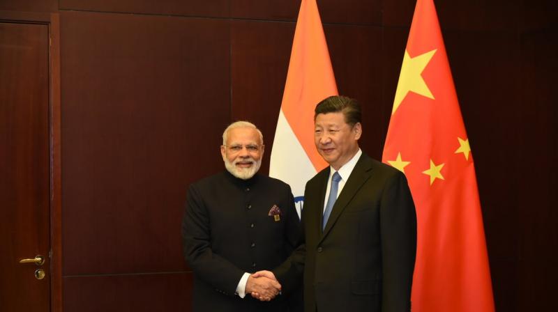 Prime Minister Narendra Modi and President Xi Jinping of China held talks on the sidelines of the SCO Summit in Astana. (Photo: Twitter/@PMOIndia)