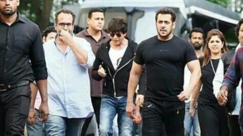 Shah Rukh Khan and Salman Khan with Aanand L Rai on the sets of the film. (Photo: instagram.com/shahrukkhan_arabicfc)