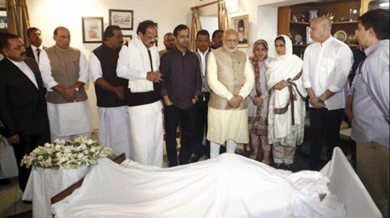 Prime Minister Narendra Modi with M Venkaiah Naidu, Rajnath Singh and other dignitaries while paying their last respects to IUML MP from Kerala E Ahamed at his residence in New Delhi on Wednesday. (Photo: PTI)