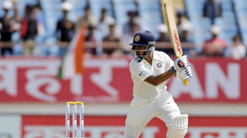 Prithvi, at 18 years and 329 days, became the second youngest to open the batting for India on Test debut. Only Vijay Mehra is ahead of him, who achieved the same when he was 17 years and 265 days. (Photo: AP)