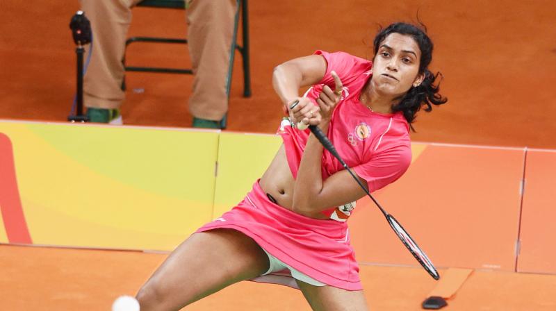PV Sindhu defeated Dinar Dyah Ayustine of Indonesia 21-8, 21-18 in a lop-sided encounter that lasted just 31 minutes. (Photo: PTI)