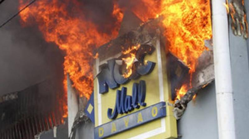 The fire broke out on Saturday at a furniture store on the malls third level and quickly engulfed an outsourcing business on the upper floor, said a spokeswoman for the city government, Ma. Teresita Gaspan. (Photo: AP)