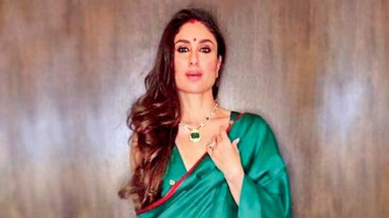 Kareena Kapoor Khan looks ethereal in this green satin number by Sanjay Garg