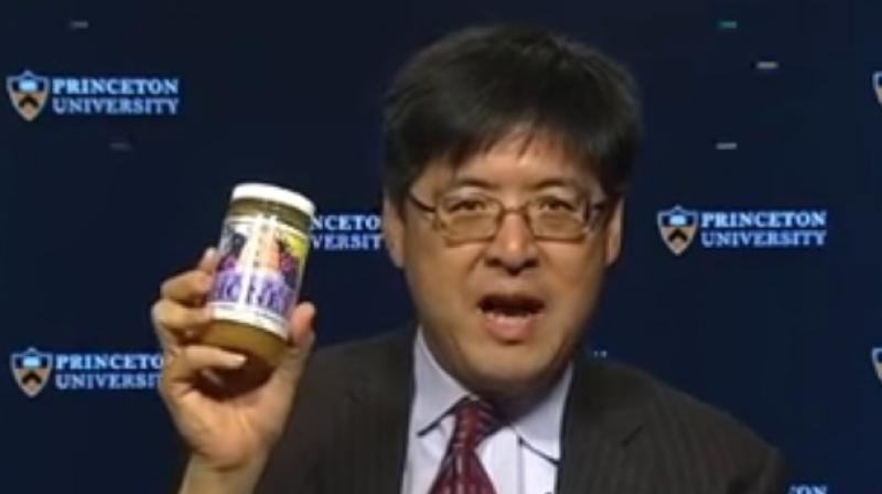 He ate from a can of gourmet-style crickets and added in some honey. (Photo: YouTube)