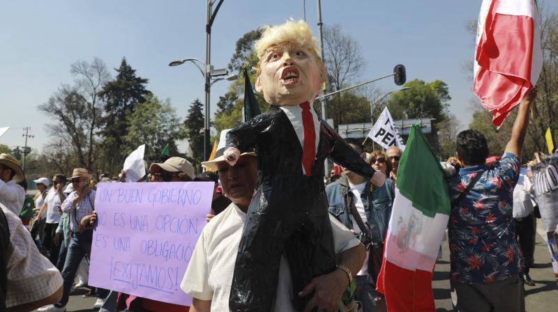 Protest erupt in Mexico as thousands gather to demand respect, reject Trump