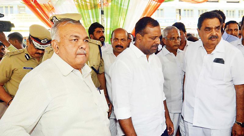 Home minister Ramalinga Reddy, forest minister Ramanath Rai and food and civil supplies minister U.T. Khader at a programme in Mangaluru on Wednesday.