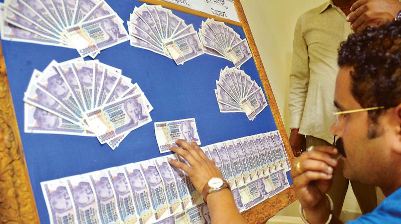 Turkish currency notes (Lira) worth Rs 70 crore In the current market, displayed at the Commissioners office , in Bengaluru on Wednesday (Photo:DC)
