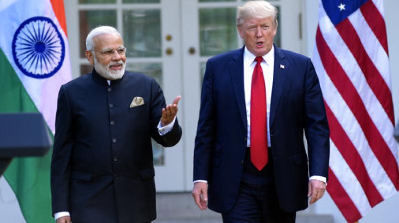 President Donald Trump and Indian Prime Minister Narendra Modi, step into the Rose Garden to make joint statements at the White House in Washington, Monday, June 26, 2017. (Photo: AP)