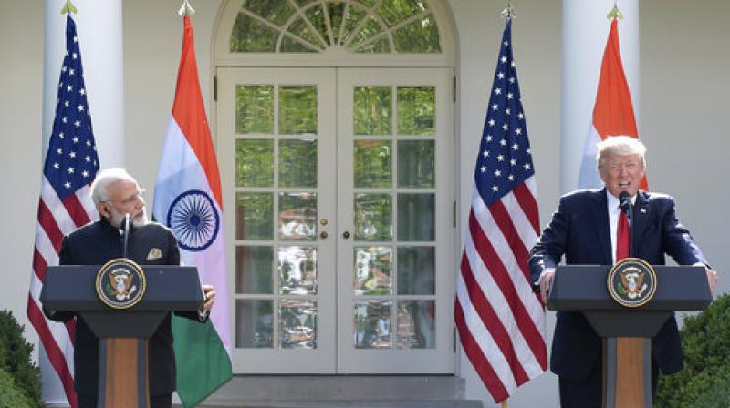 President Donald Trump speaks as Indian Prime Minister Narendra Modi listens as they take turns making a statement in the Rose Garden of the White House in Washington, Monday, June 26, 2017. (Photo: AP)