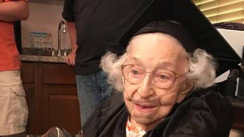 Theresia Brandl donned a cap and gown Wednesday at her Oakdale nursing home to celebrate. (Photo: Facebook)