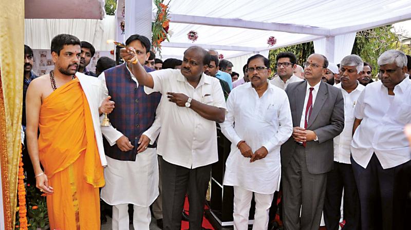 Chief Minister H.D. Kumaraswamy launches the construction of Karnataka Bhavan-I in New Delhi on Friday. Deputy CM Dr G. Parameshwar and PWD Minister H.D. Revanna were present.