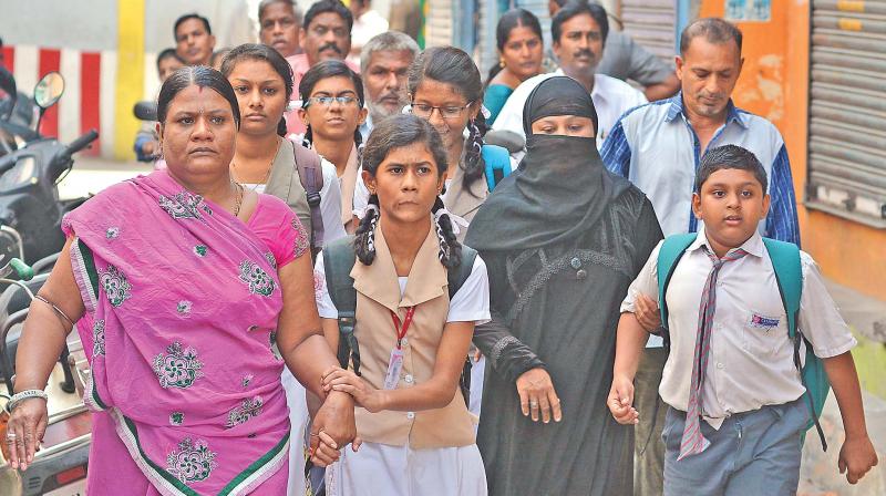 Tension surfaced among parents who thronged  educational institutions to ensure safety of their wards.  A scene in Triplicane (Photo: DC)
