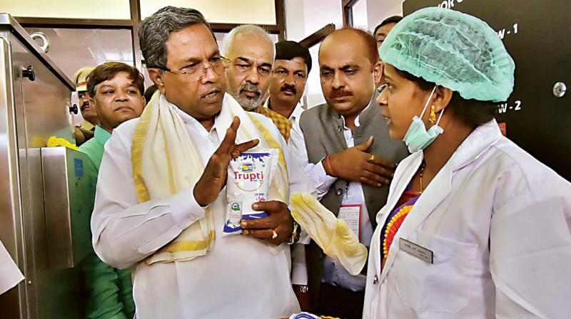 Siddaramaiah reiterated his governments commitment to enhance the reservation quota for SCs, STs and OBCs from 50 per cent to 70 per cent. (Photo: DC)
