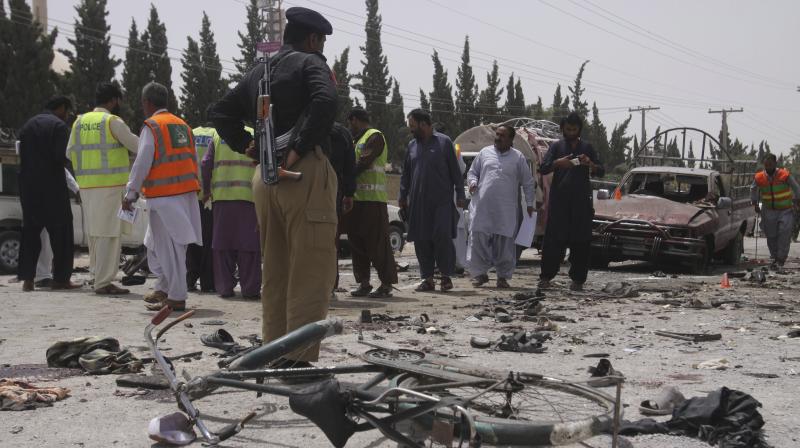 Pakistani security personnel visit the site of bombing in Quetta, Pakistan. (Photo: AP)