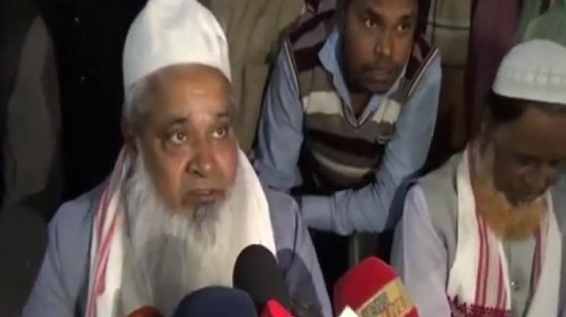 During a press interaction after a function where he felicitated the panchayat election winners of South Salmara district, the journalist asked AIUDF chief if he would ally with the Congress or the BJP in the future. (Photo: ANI)
