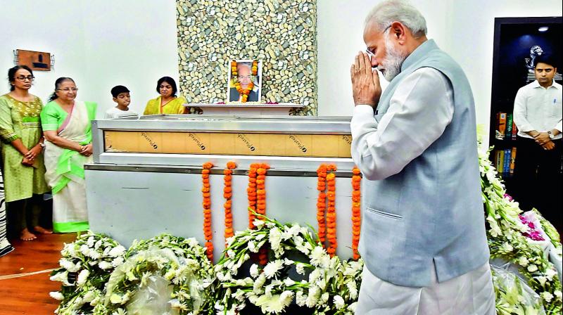 Prime Minister Narendra Modi pays respect to the mortal remains of environment minister Anil Madhav Dave at his residence in New Delhi on Thursday. (Photo: PTI)
