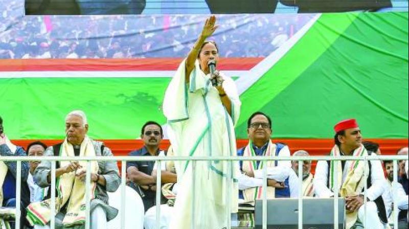 West Bengal CM and Trinamul Congress chief Mamata Banerjee speaks during the Opposition parties mega United India rally at the historic Brigade Ground in Kolkata. (Photo: PTI)
