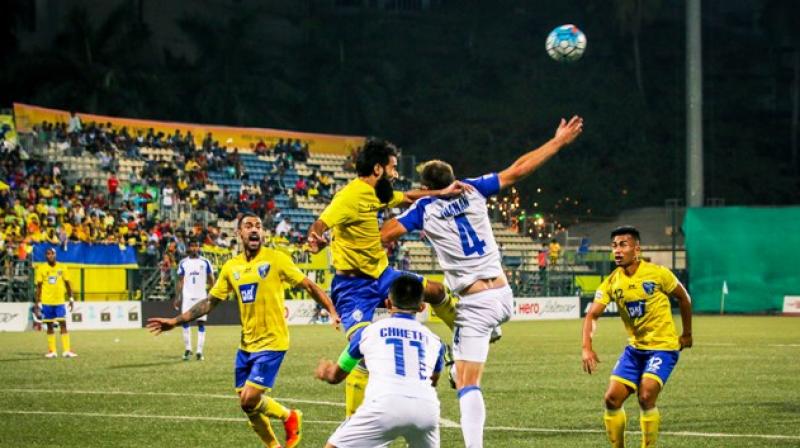 Mumbai FC (yellow) and Bengaluru FC in the thick of the action at the Cooperage ground. (Photo: I-League)