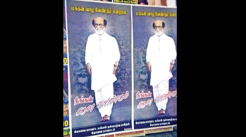 Super star Rajinikanth supporters put up posters on Anna Salai on Thursday, requesting the actor to enter politics. (Photo: DC)