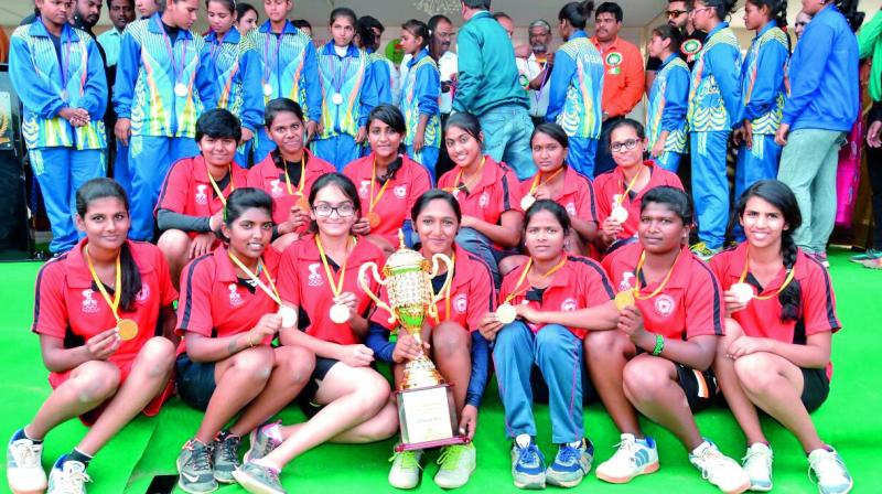 Players of the Telangana girls throwball team are all smiles after winning the School Games Federation of India tournament in Hyderabad.