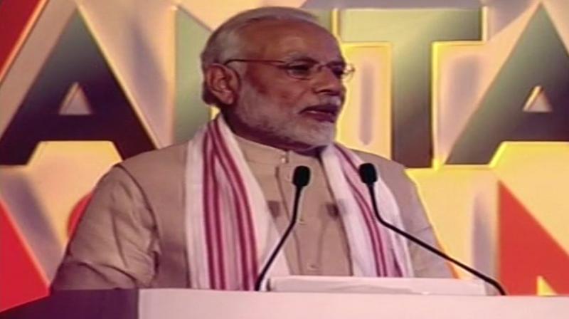 Prime Minister Narendra Modi addresses the inaugural session of Advantage Assam-Global Investors Summit18 in Guwahati. (Photo: ANI/Twitter)
