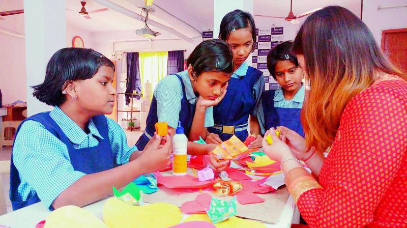 Art for the heart: Students of Ashray Akruti work on an art project. (Photo: DC)
