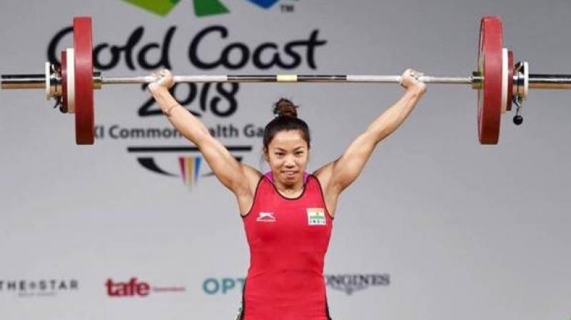 Star Indian weightlifter Mirabai Chanus coach Vijay Sharma and veteran cricket coach Tarak Sinha are among seven recommended by the selection committee for the Dronacharya Award. (Photo: PTI)